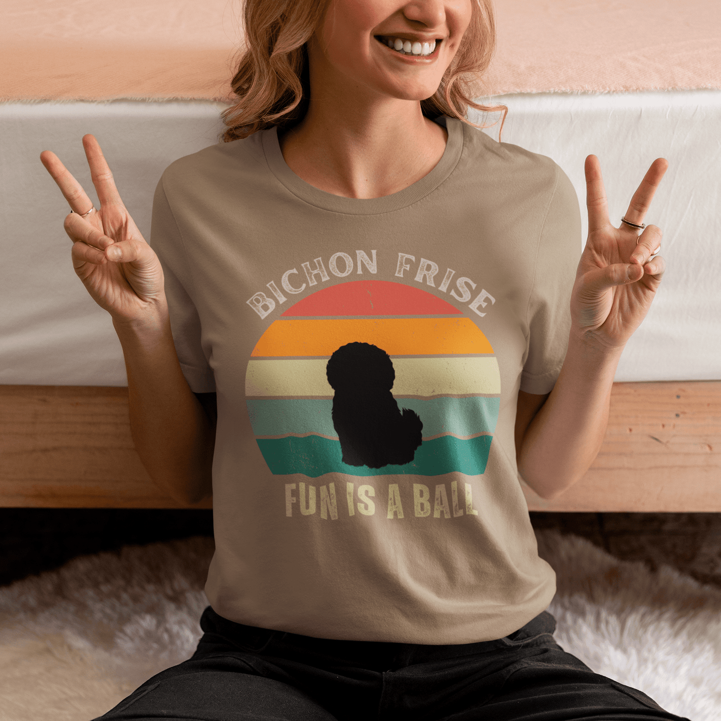 "Colorful unisex t-shirt with playful 'Bichon Frise Fun Is A Ball' text and graphic design, perfect for proud Bichon Frise dog owners – funny and stylish pet lover apparel."
