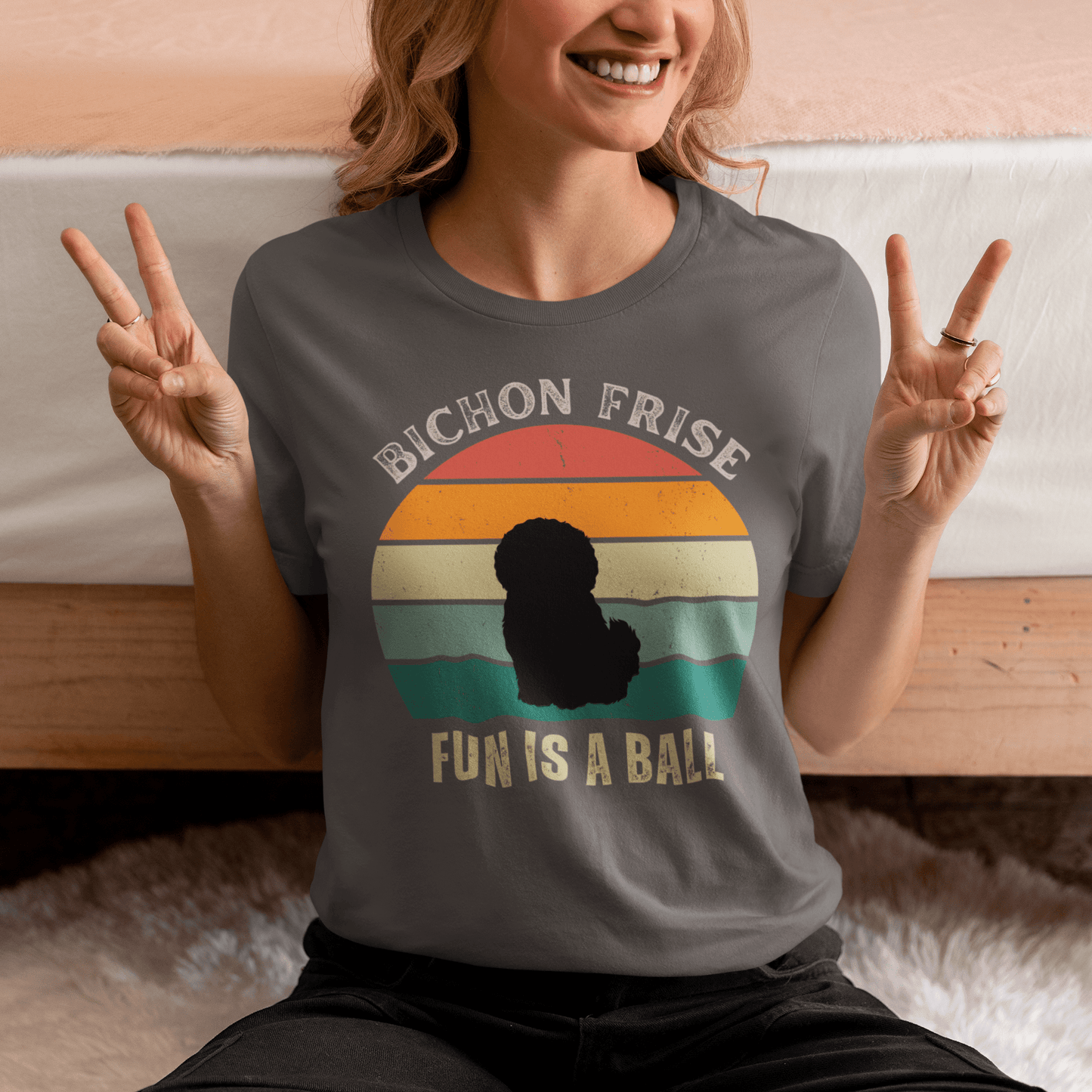 "Colorful unisex t-shirt with playful 'Bichon Frise Fun Is A Ball' text and graphic design, perfect for proud Bichon Frise dog owners – funny and stylish pet lover apparel."