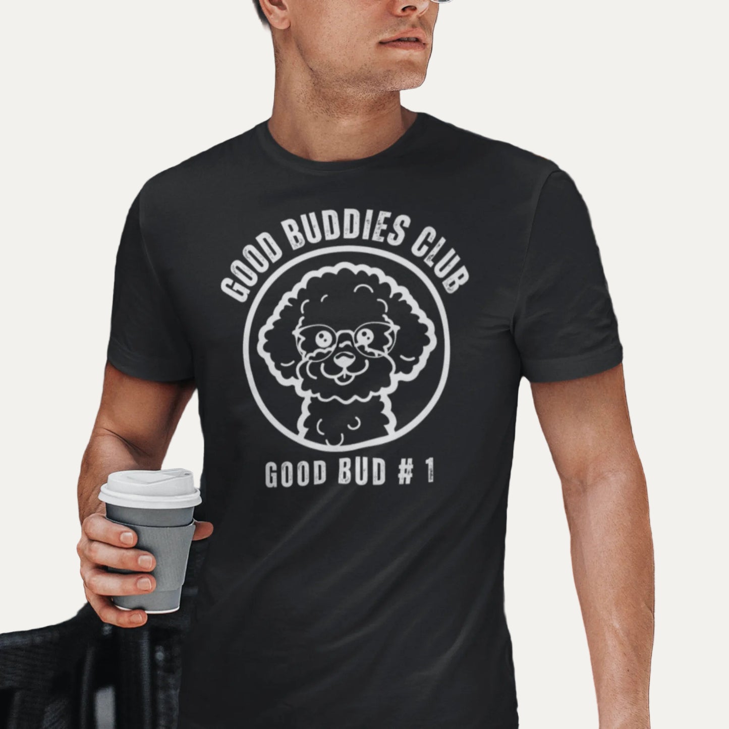 “Good Buddies Club unisex T-shirt featuring a cheerful, smiling Bichon Frise dog wearing glasses illustration with white design. Fun and happy dog-themed shirt for men and women, perfect for dog owners and dog lovers beyond just Bichon Frise fans.”