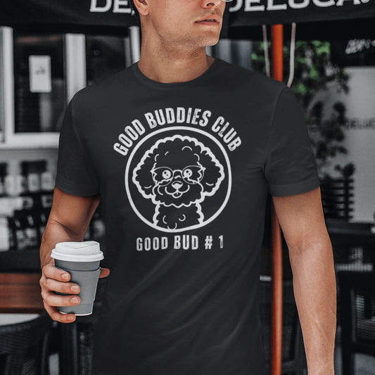 “Good Buddies Club unisex T-shirt featuring a cheerful, smiling Bichon Frise dog wearing glasses illustration with white design. Fun and happy dog-themed shirt for men and women, perfect for dog owners and dog lovers beyond just Bichon Frise fans.”