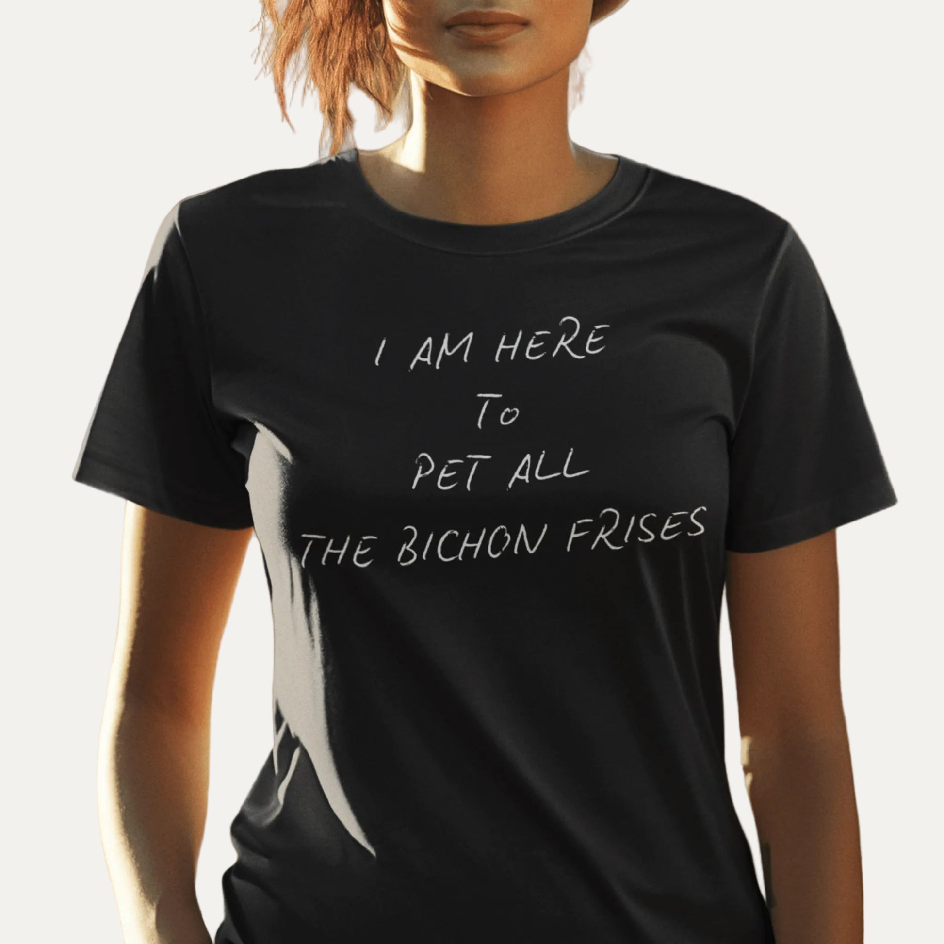 Funny unisex white t-shirt with the quote "I Am Here To Pet All The Bichon Frises," minimalist design perfect for Bichon Frise dog lovers and friends, featuring a cheerful and unique phrase.