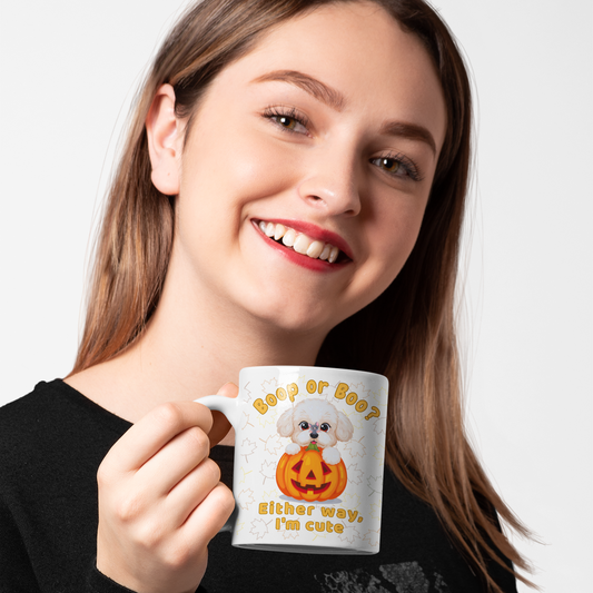 Woman holding a mug with a Halloween-themed design featuring a dog and pumpkin.