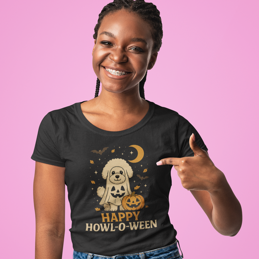 Smiling woman wearing a black t-shirt with a cute Bichon Frise in ghost costume and pumpkin, featuring the text "Happy Howl-o-ween", perfect for dog lovers and Halloween fans.