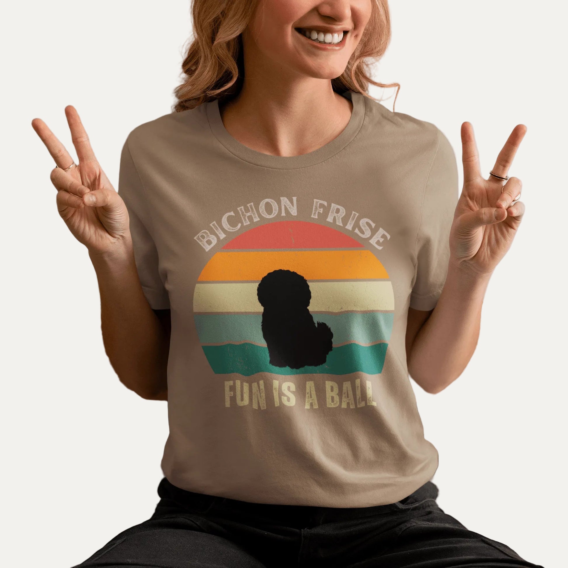 "Colorful unisex t-shirt with playful 'Bichon Frise Fun Is A Ball' text and graphic design, perfect for proud Bichon Frise dog owners – funny and stylish pet lover apparel."