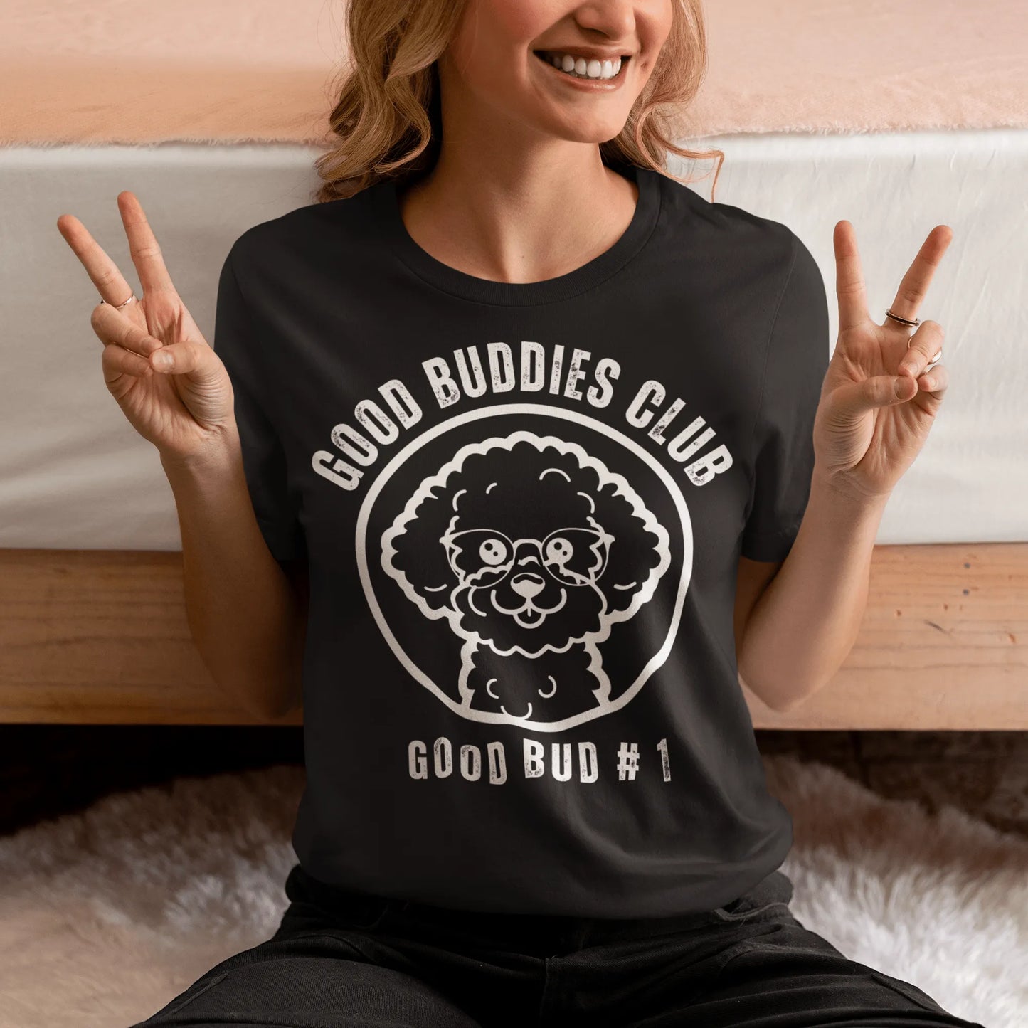 “Good Buddies Club unisex T-shirt featuring a cheerful, smiling Bichon Frise dog wearing glasses illustration with white design. Fun and happy dog-themed shirt for men and women, perfect for dog owners and dog lovers beyond just Bichon Frise fans.”