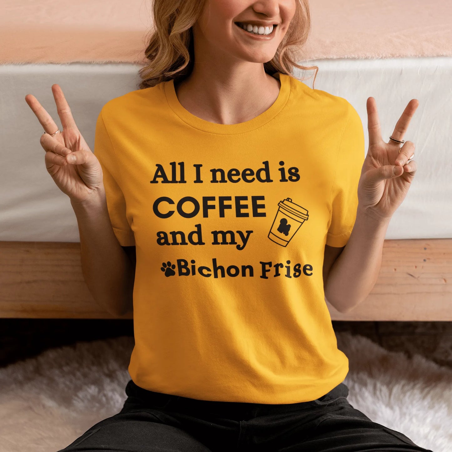 Black unisex T-shirt with "All I need is coffee and my Bichon" design – perfect for Bichon Frise dog owners and coffee lovers.