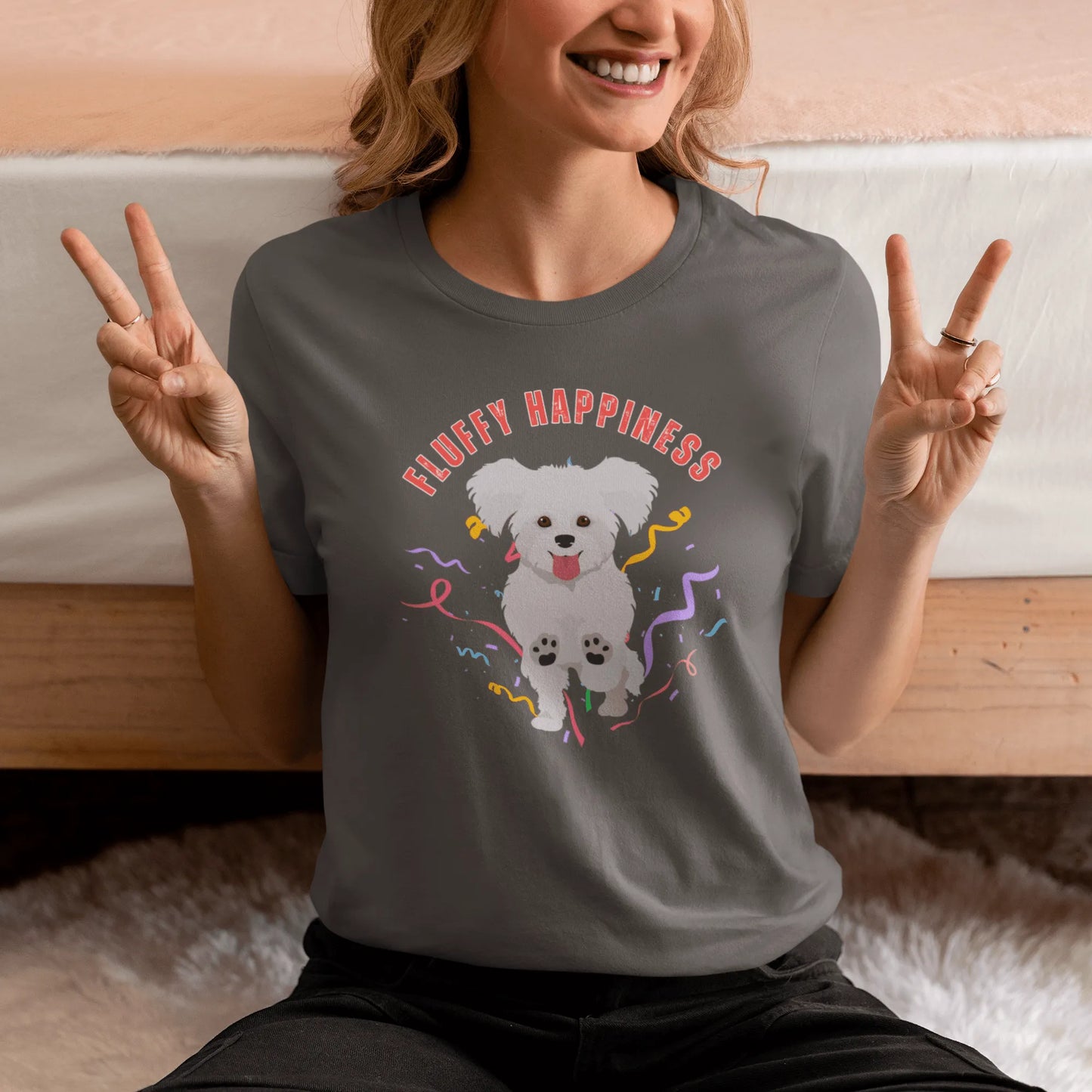 "Colorful 'Fluffy Happiness' Bichon Frise graphic t-shirt – unisex white tee with cheerful white text and a cute, original Bichon dog illustration, perfect for dog lovers and Bichon Frise owners."