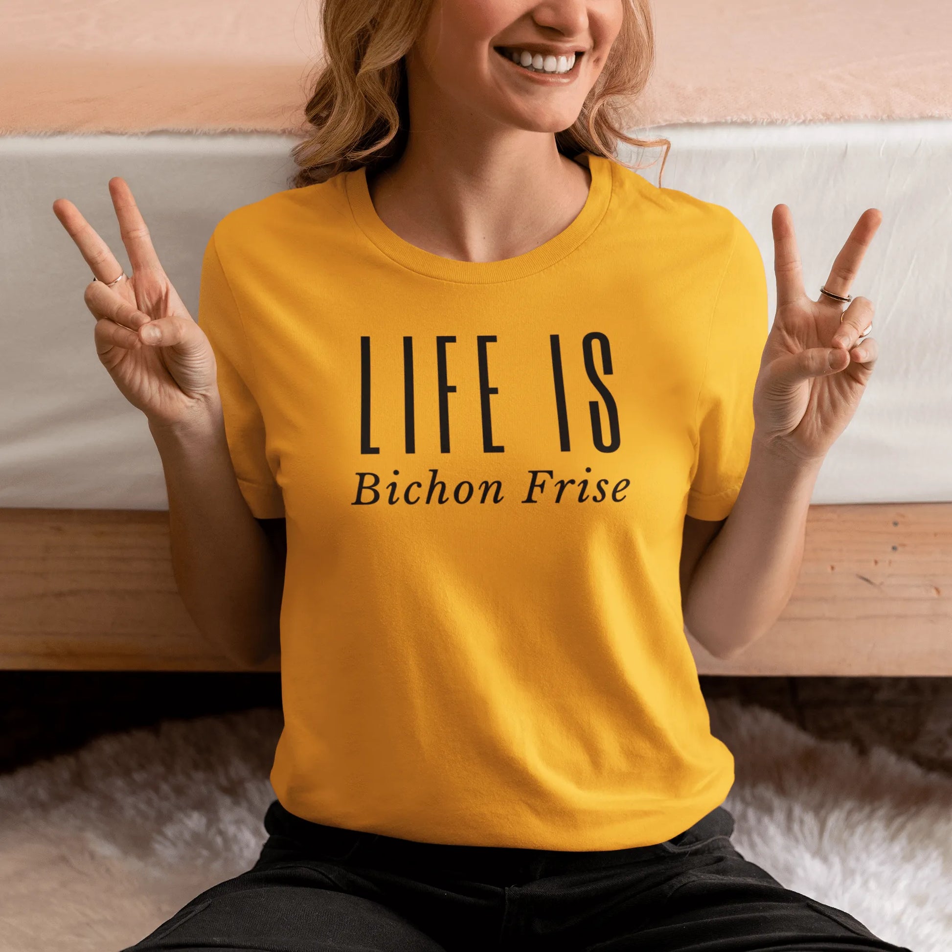 "Funny unisex black text T-shirt reading 'Do You Know What Real Luxury Is? Living With A Bichon!' – perfect for Bichon Frise dog lovers, pet owners, and anyone who enjoys quirky, stylish dog-themed fashion."